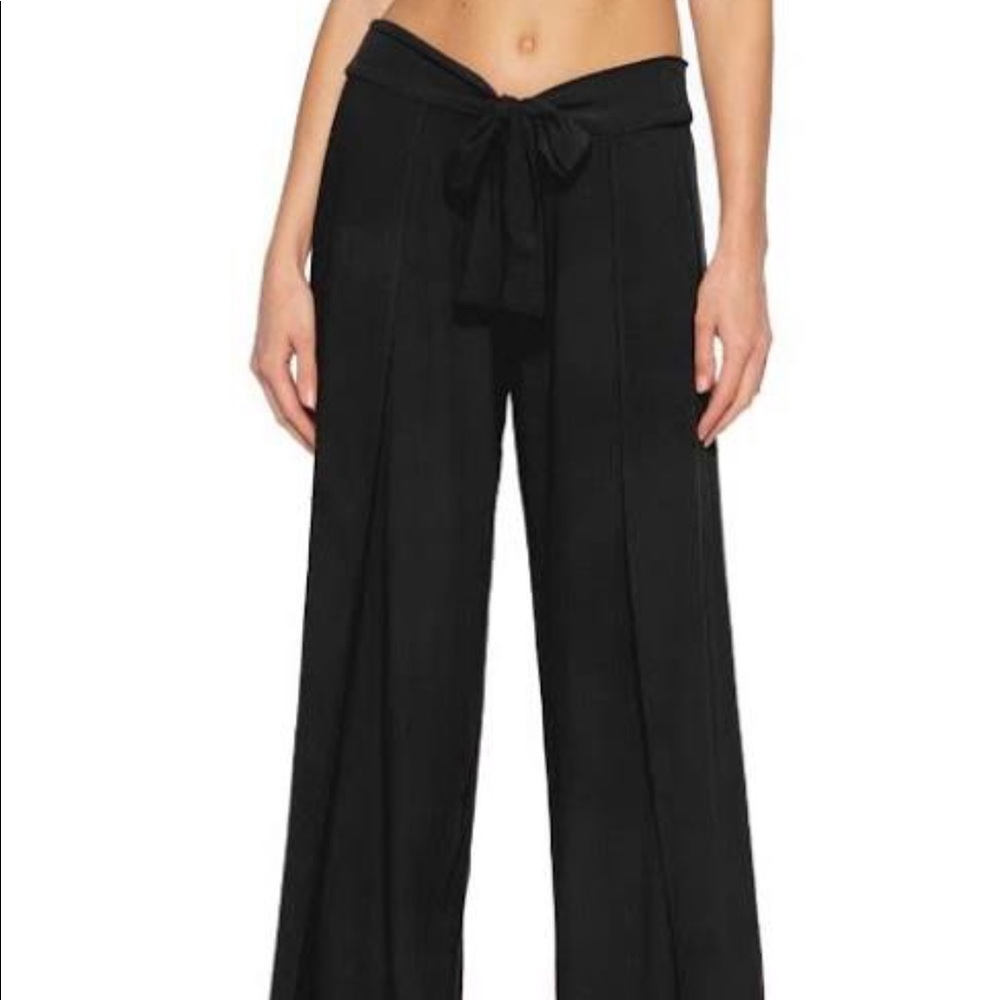 Becca rust colored cover up pants
